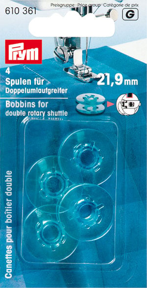 Bobbins for double rotary shuttle