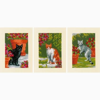 Greeting Cards: Cats between flowers
