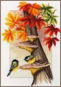 Chickadees between leaves