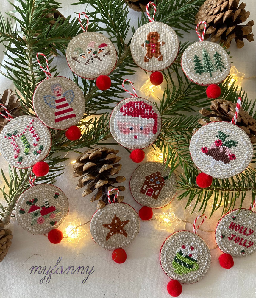 Cross stitch Christmas tree in a holly frame embroidery design