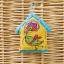 Yellow birdhouse for love birds