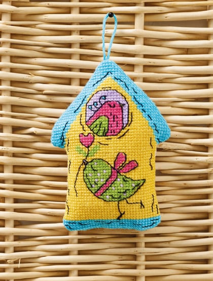 Yellow birdhouse for love birds