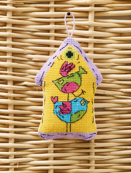 Yellow birdhouse