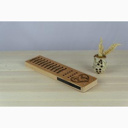 Bobbin stand with magnet for needles