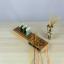 Bobbin stand with magnet for needles